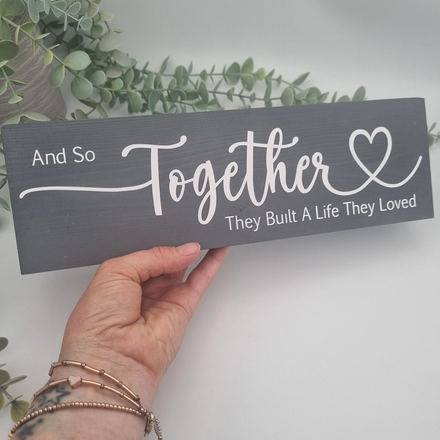 And so together they built a life they loved wooden sign for family home