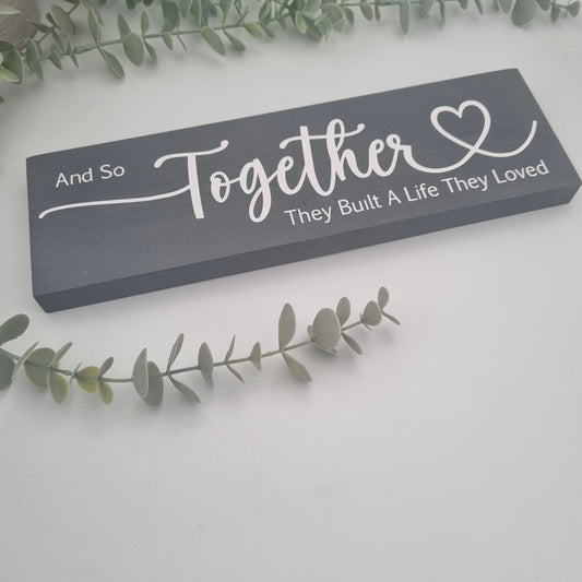 And so together they built a life they loved wooden sign for family home
