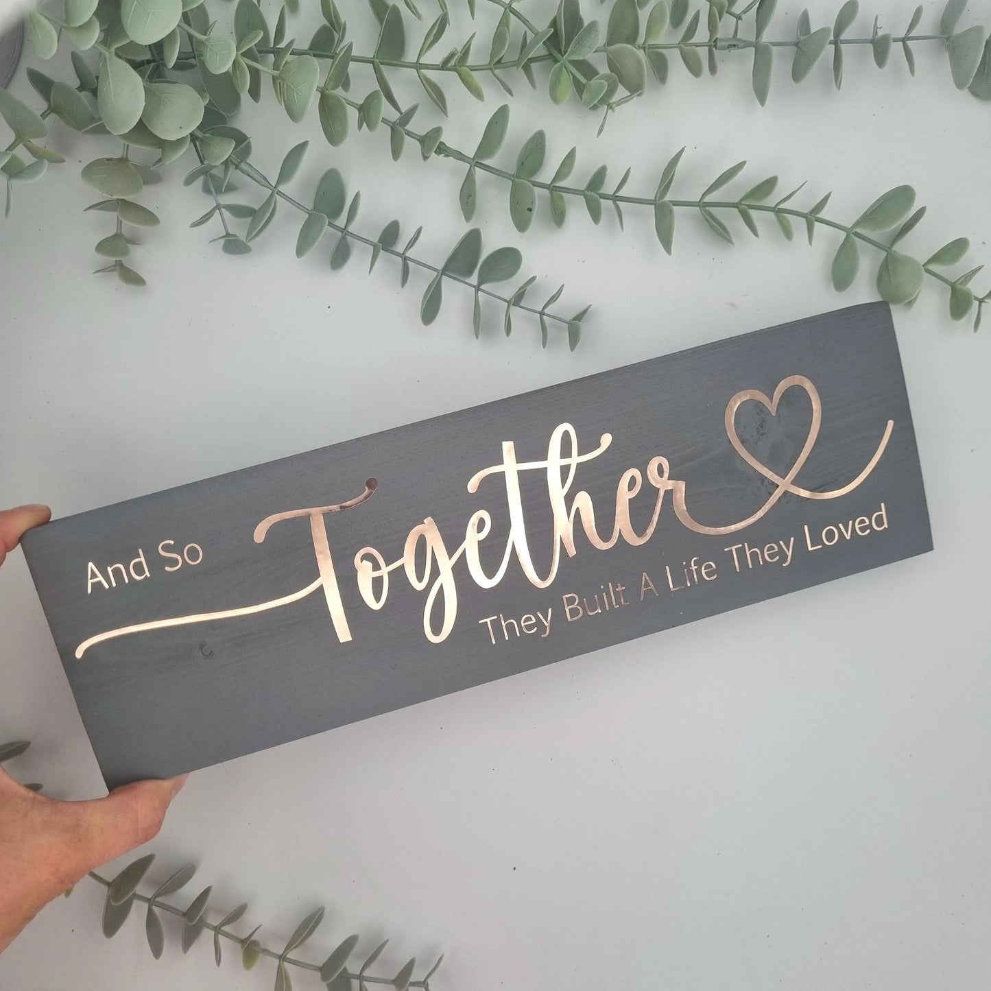 And so together they built a life they loved wooden sign for family home