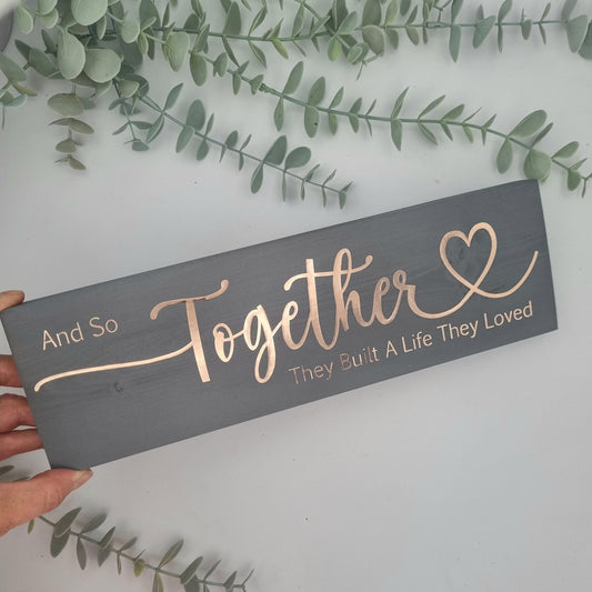 And so together they built a life they loved wooden sign