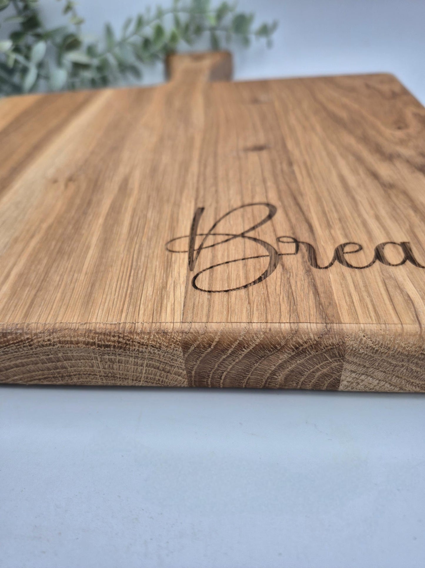 Chunky oak engraved chopping bread board with handle