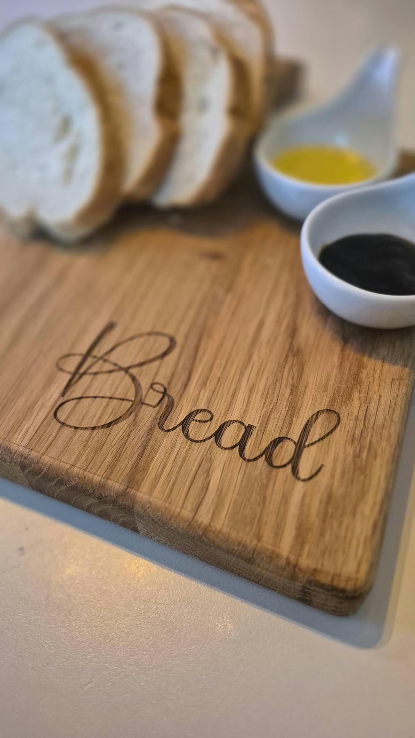 Chunky oak engraved chopping bread board with handle