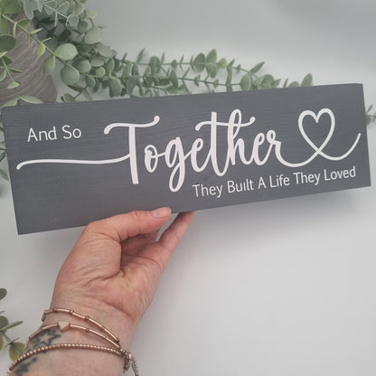 And so together they built a life they loved wooden sign