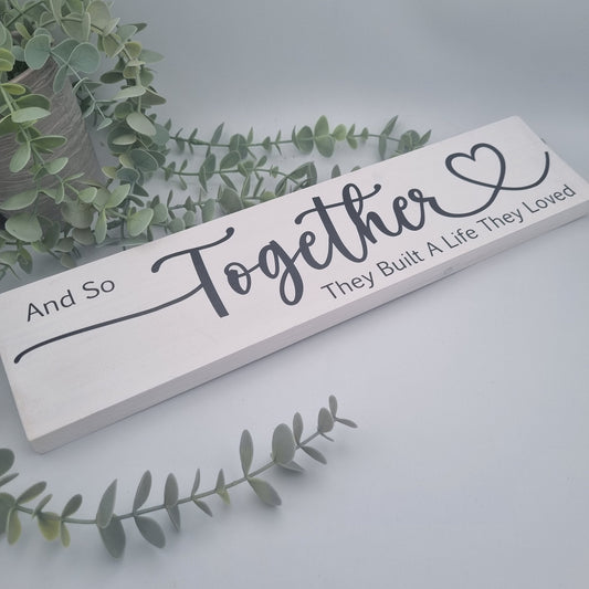 And so together they built a life they loved wooden sign