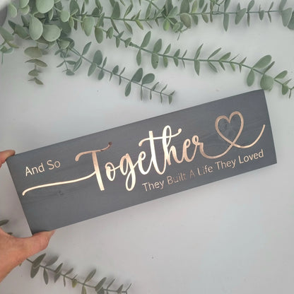 And so together they built a life they loved wooden sign for family home