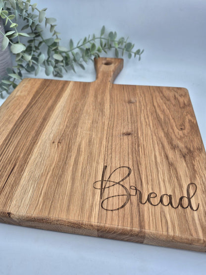 Chunky oak engraved chopping  bread board with handle