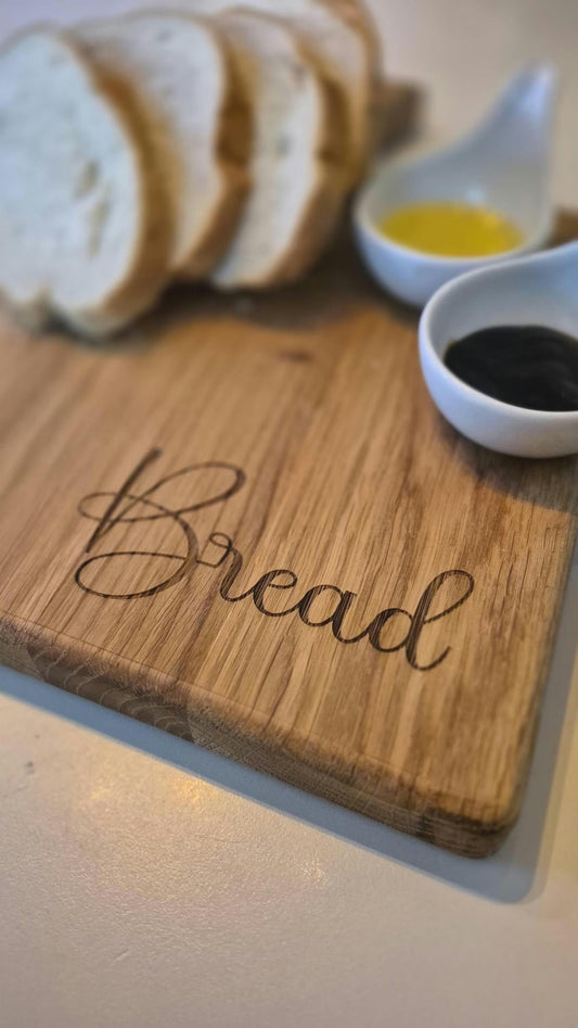 Chunky oak engraved chopping  bread board with handle